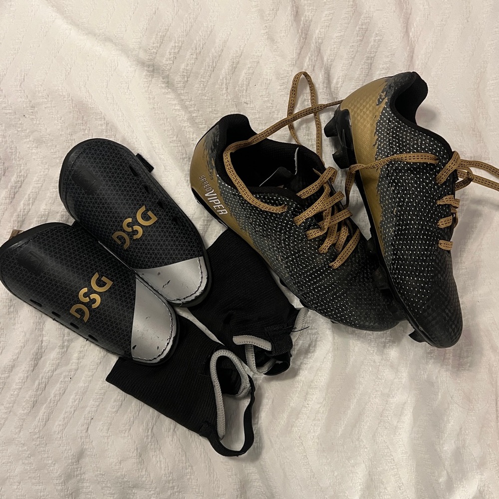 DSG Black and Gold Soccer Cleats with Shin Guards
